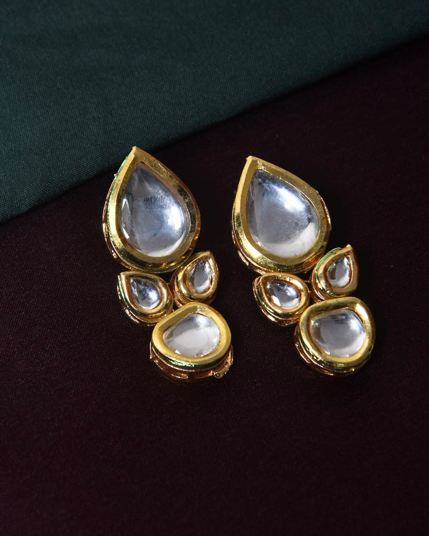 Gold and silver teardrop-shaped earrings with multiple smaller teardrop accents.